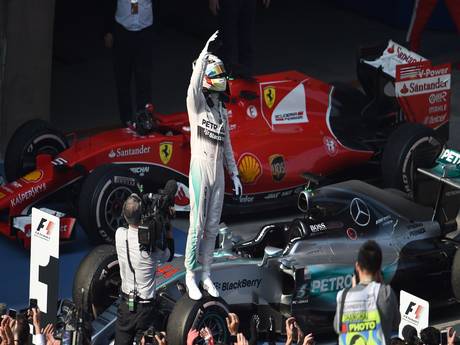 Lewis Hamilton celebrates winning the Chinese Grand Prix 2015