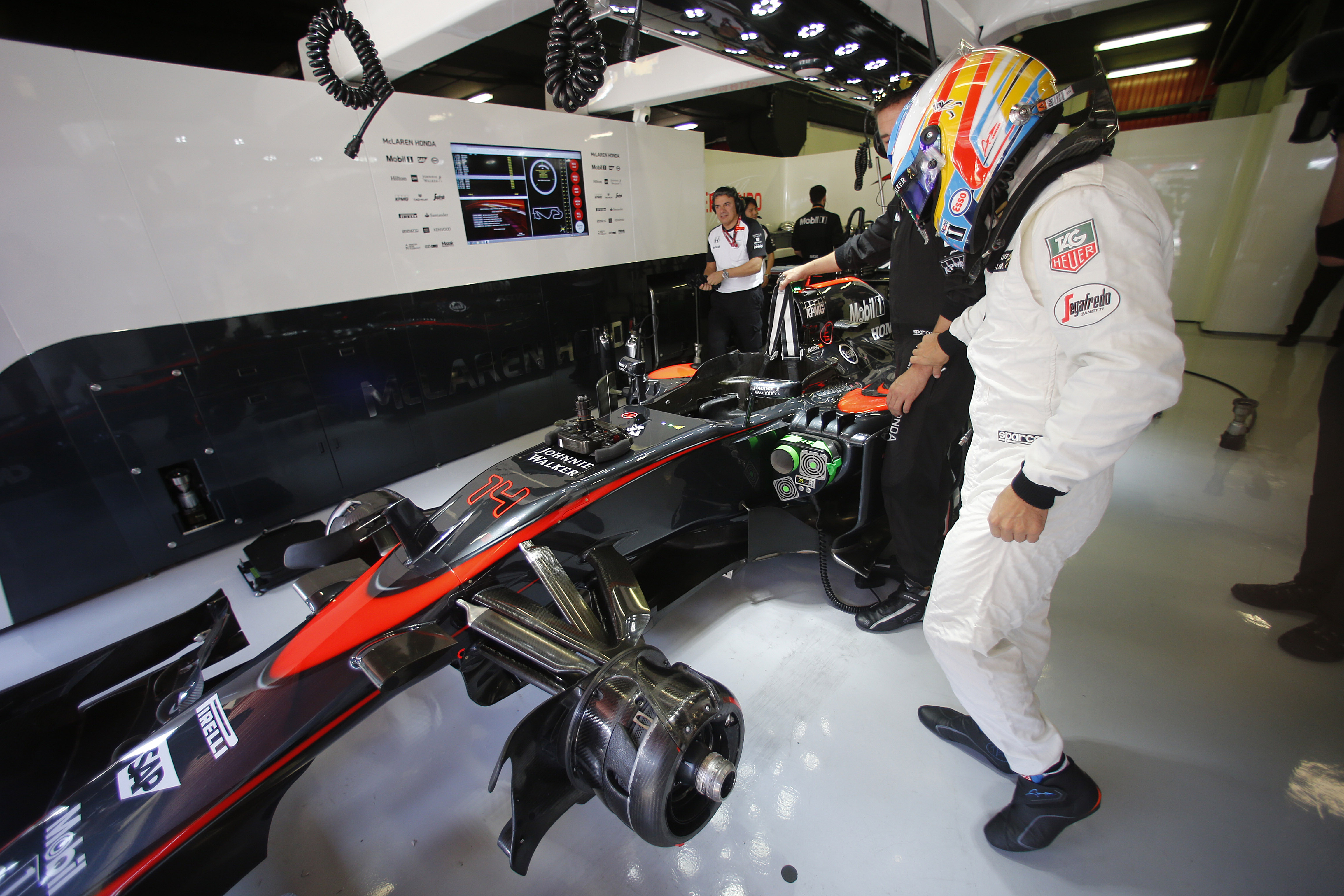 Fernando Alonso in the garage.