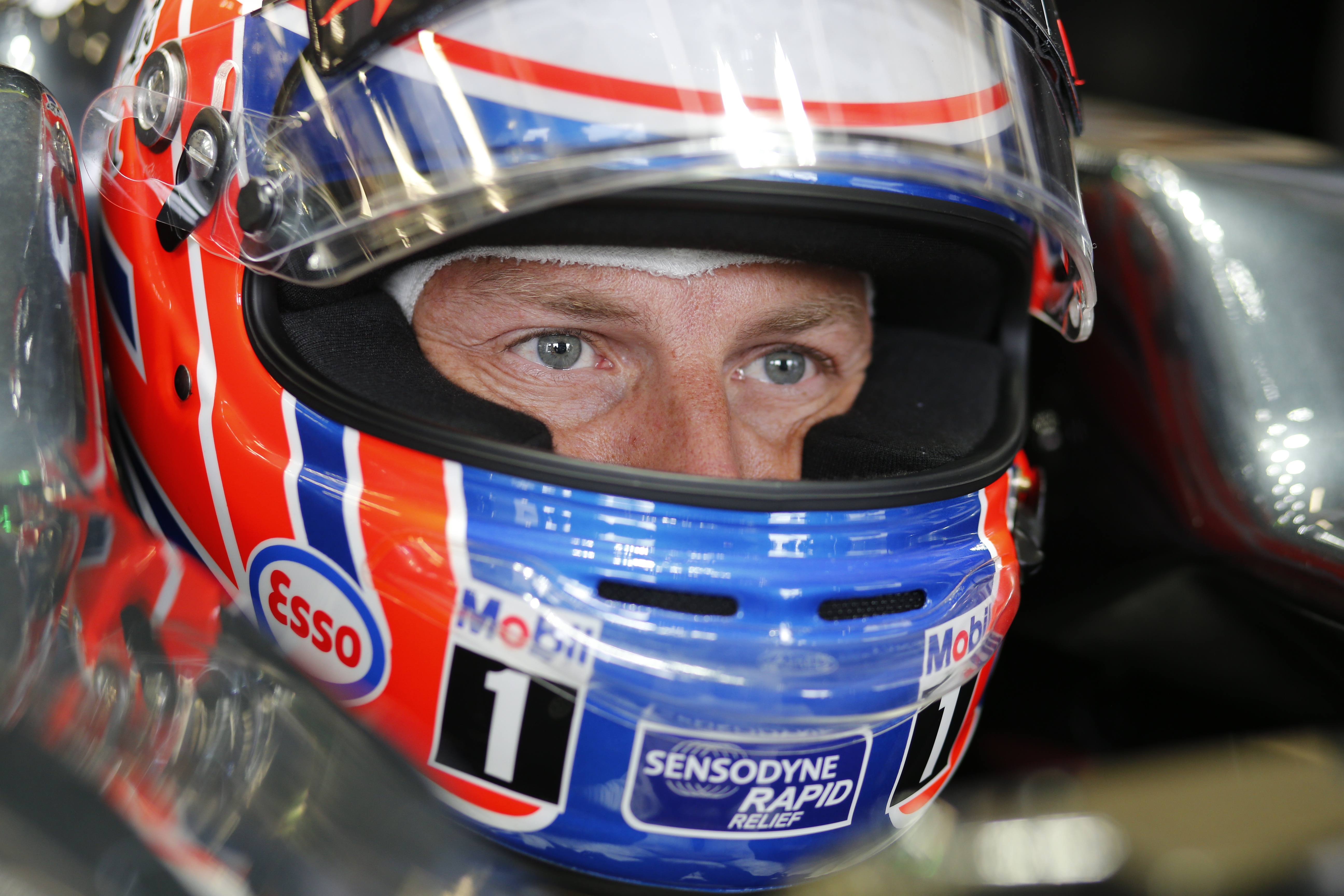 Jenson Button in cockpit in the garage.