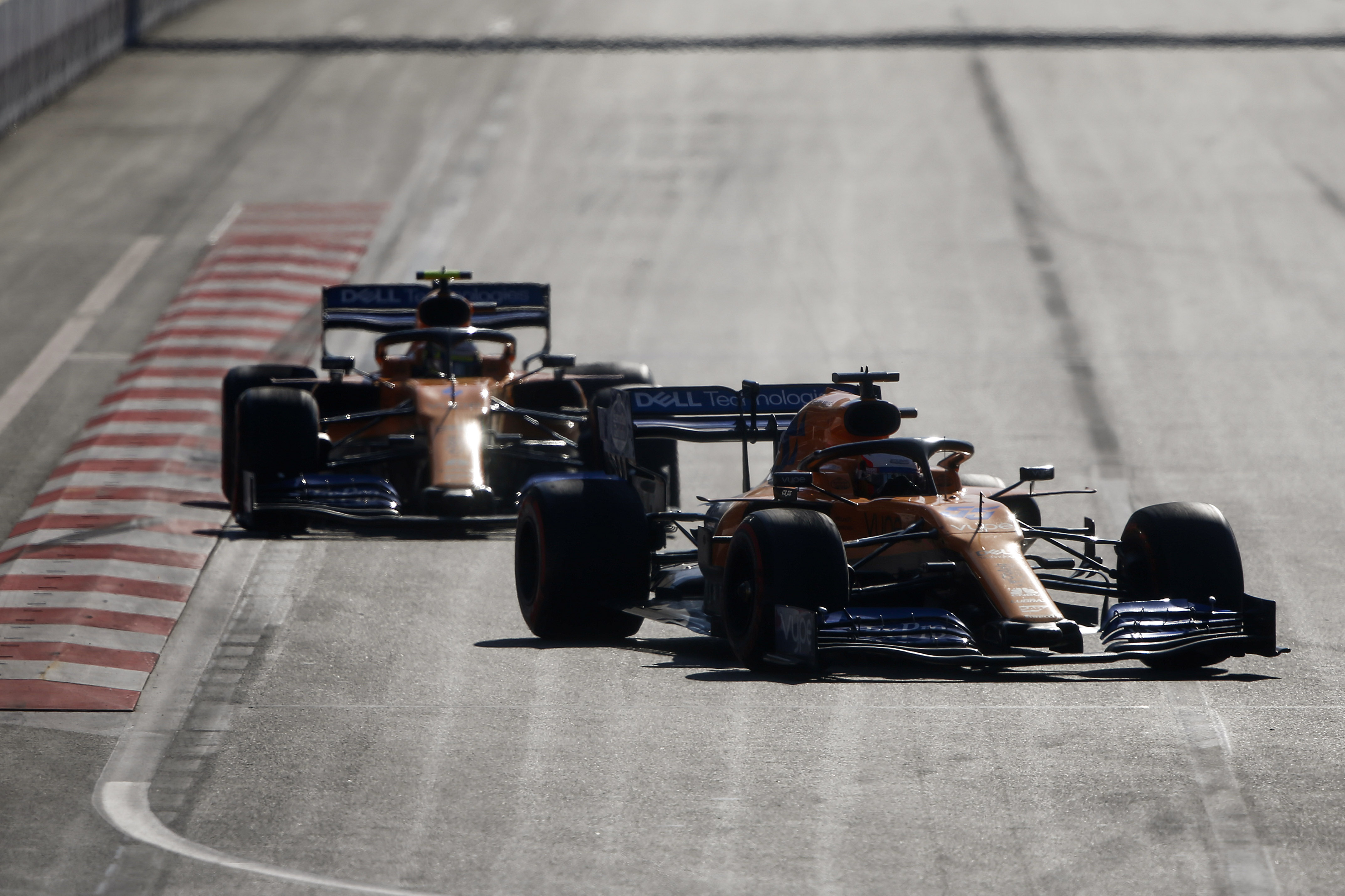Carlos Sainz Jr., McLaren MCL34, leads Lando Norris, McLaren MCL34