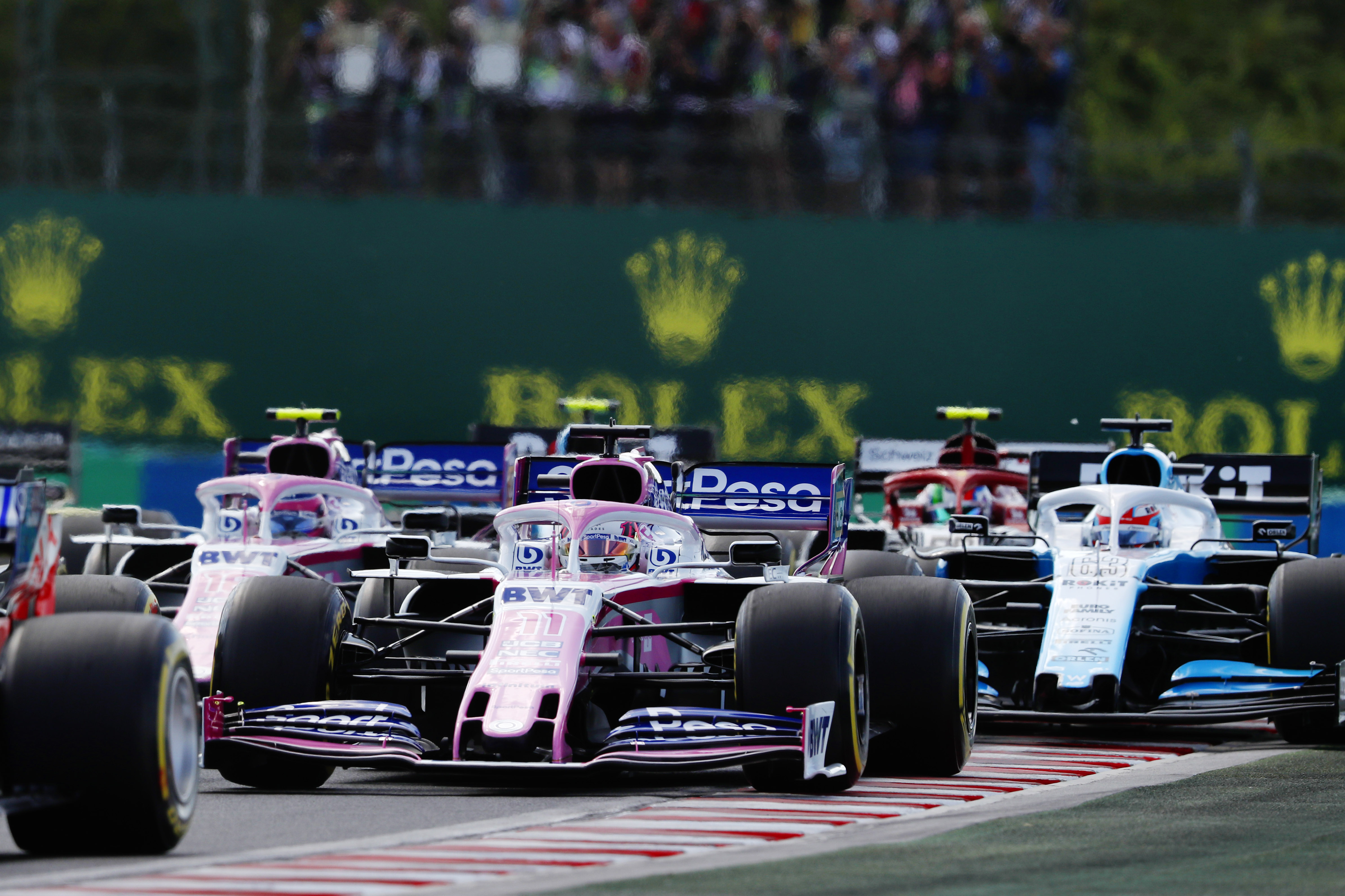 Sergio Perez, Racing Point RP19, leads Lance Stroll, Racing Point RP19